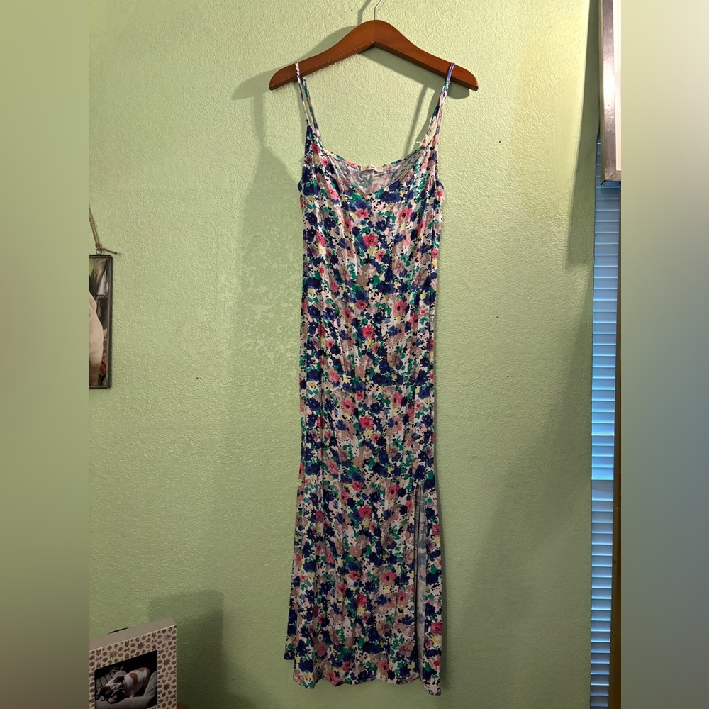 Cute midi slip dress with slit on the side. Like new, never been worn sz S.